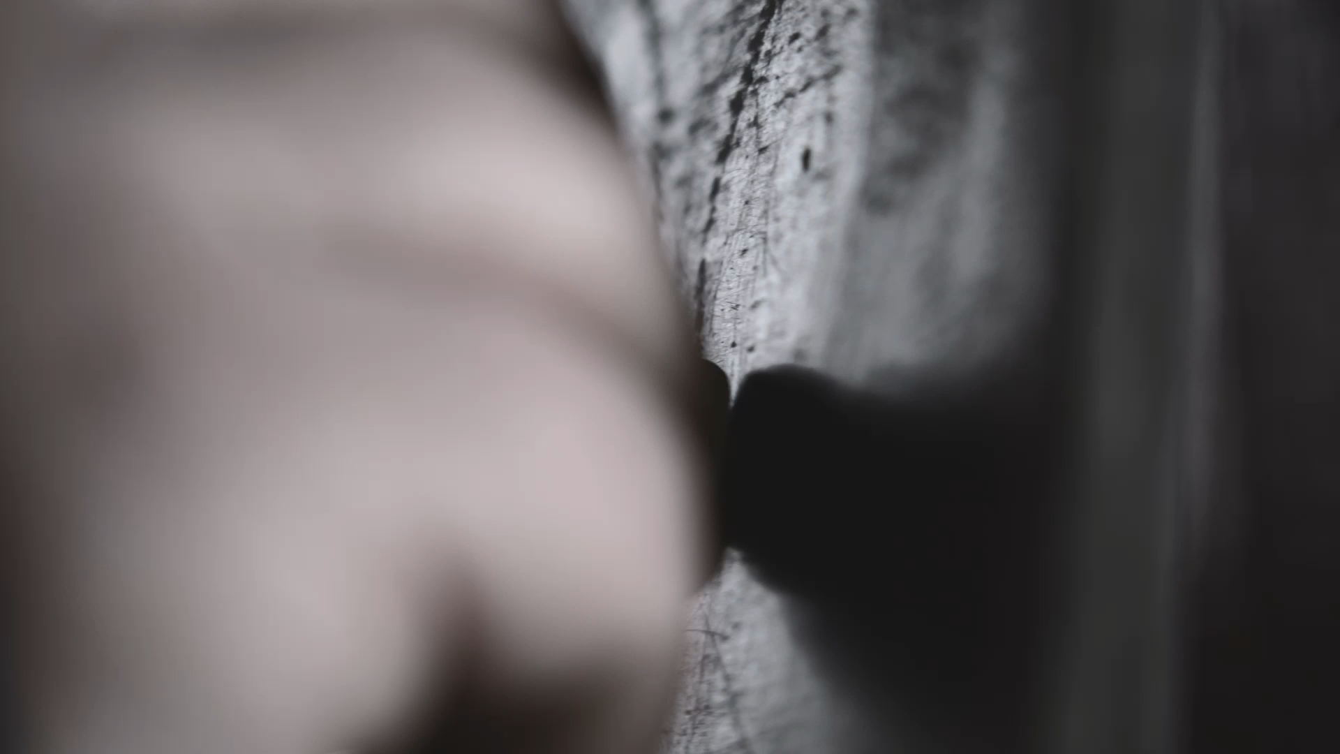 Close up of someone hand writing on a page